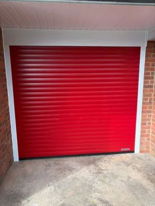 Red Hörmann RollMatic T Roller Garage Door Installation in Amblecote