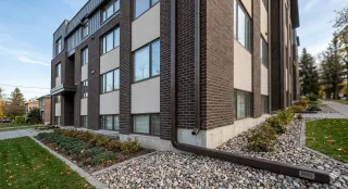 Why Your Commercial Eavestrough Downspouts Are Failing (And What to Do)