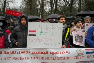 وقفة احتجاجية لليمنيين تنديدا بتأخير قرارات اللجوء