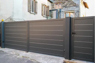 Portail coulissant aluminium motorisé Vosges – Gain de place et sécurité