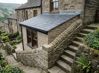 Stone matched extension on a sloping Colne plot, Premier Construction Solutions