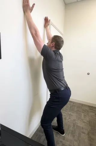 Overhead Wall Squat (Thoracic Extension)