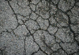 Crack Filling Vs Sealcoating for Maine Driveways in Fall