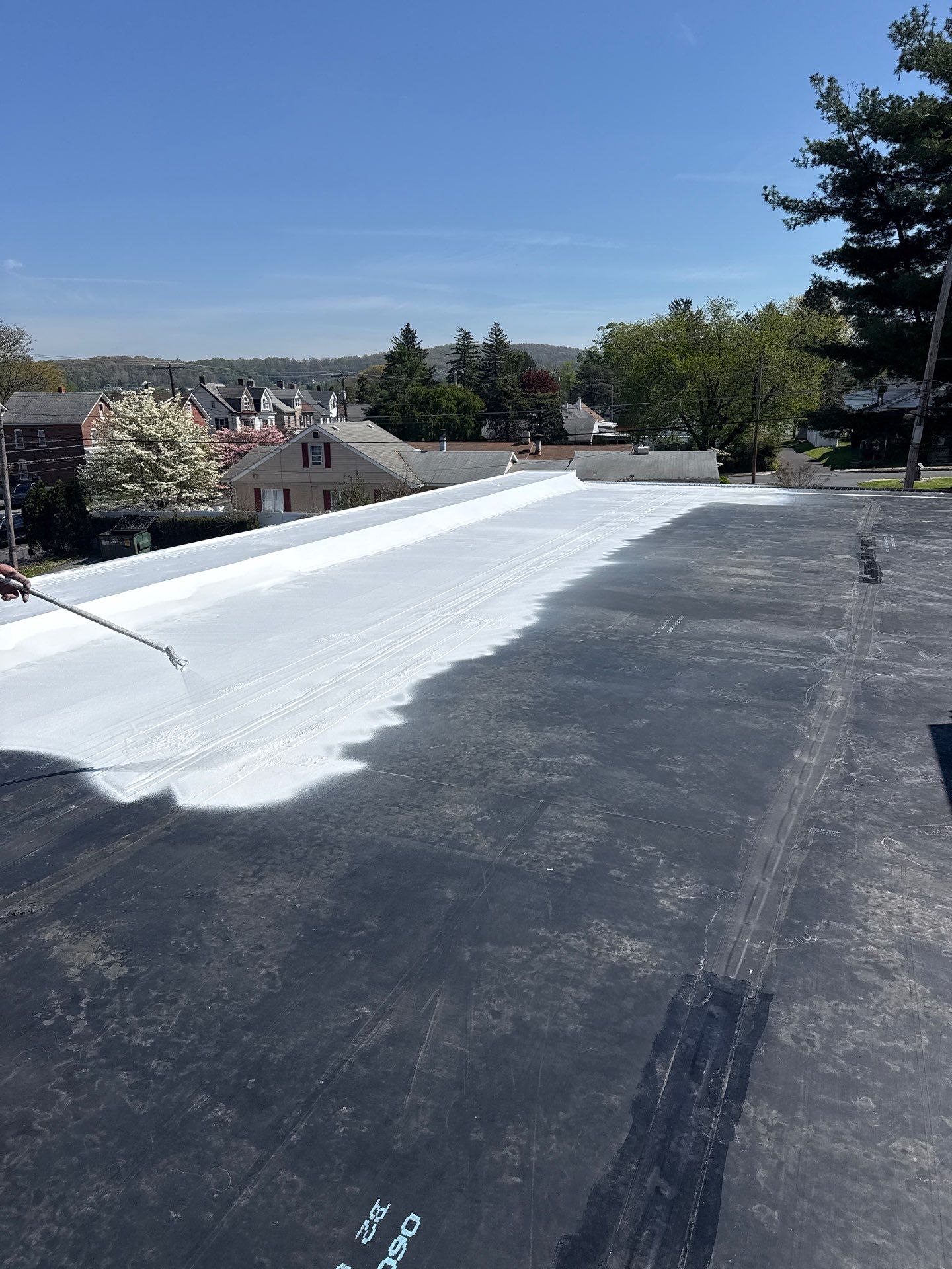 Roofing Middleburg PA: Your Guide to Commercial Roof Coatings vs. Full Replacement