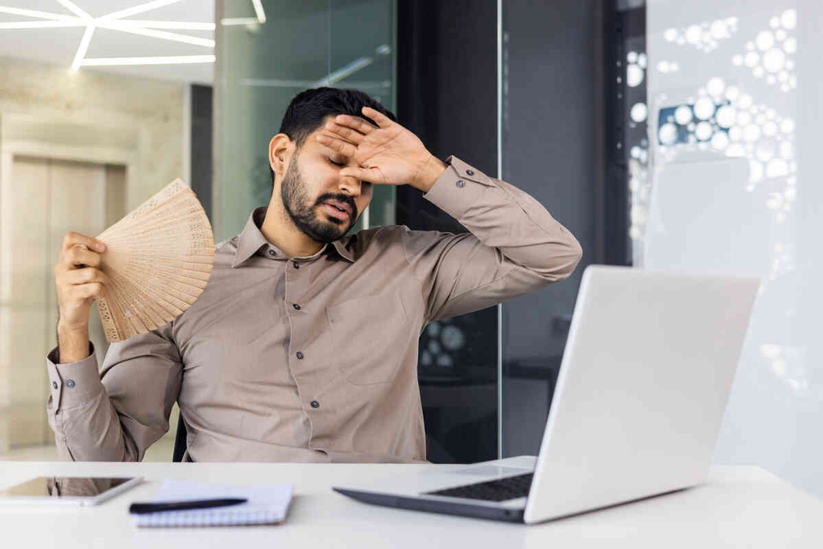 Why Your Office Feels Too Bright and Too Hot at the Same Time