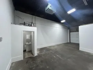 Empty commercial warehouse after a Junk Bandits cleanout