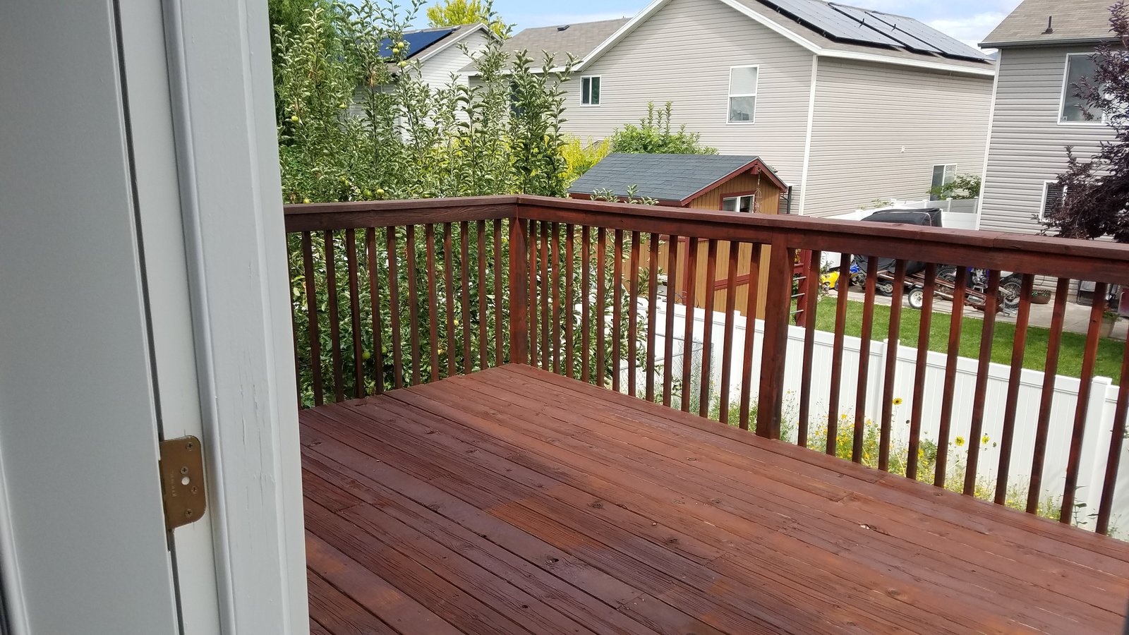 Can You Paint Over Exterior Stained Wood? Decks, Fences, and Siding