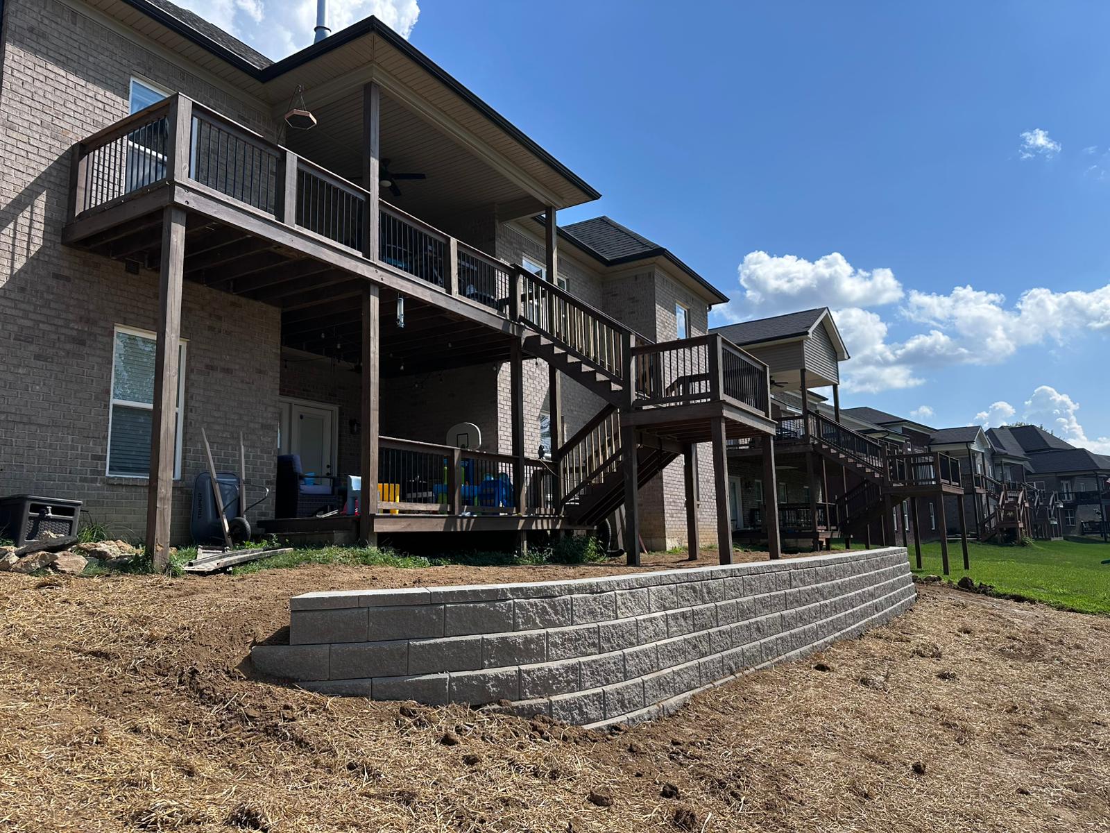 Retaining Walls in Louisville KY: Signs, Materials and Planning Tips
