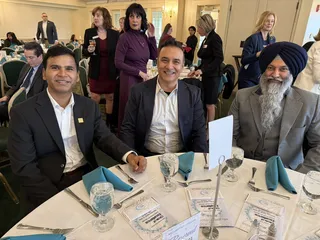 A group gathered at a real estate community event.