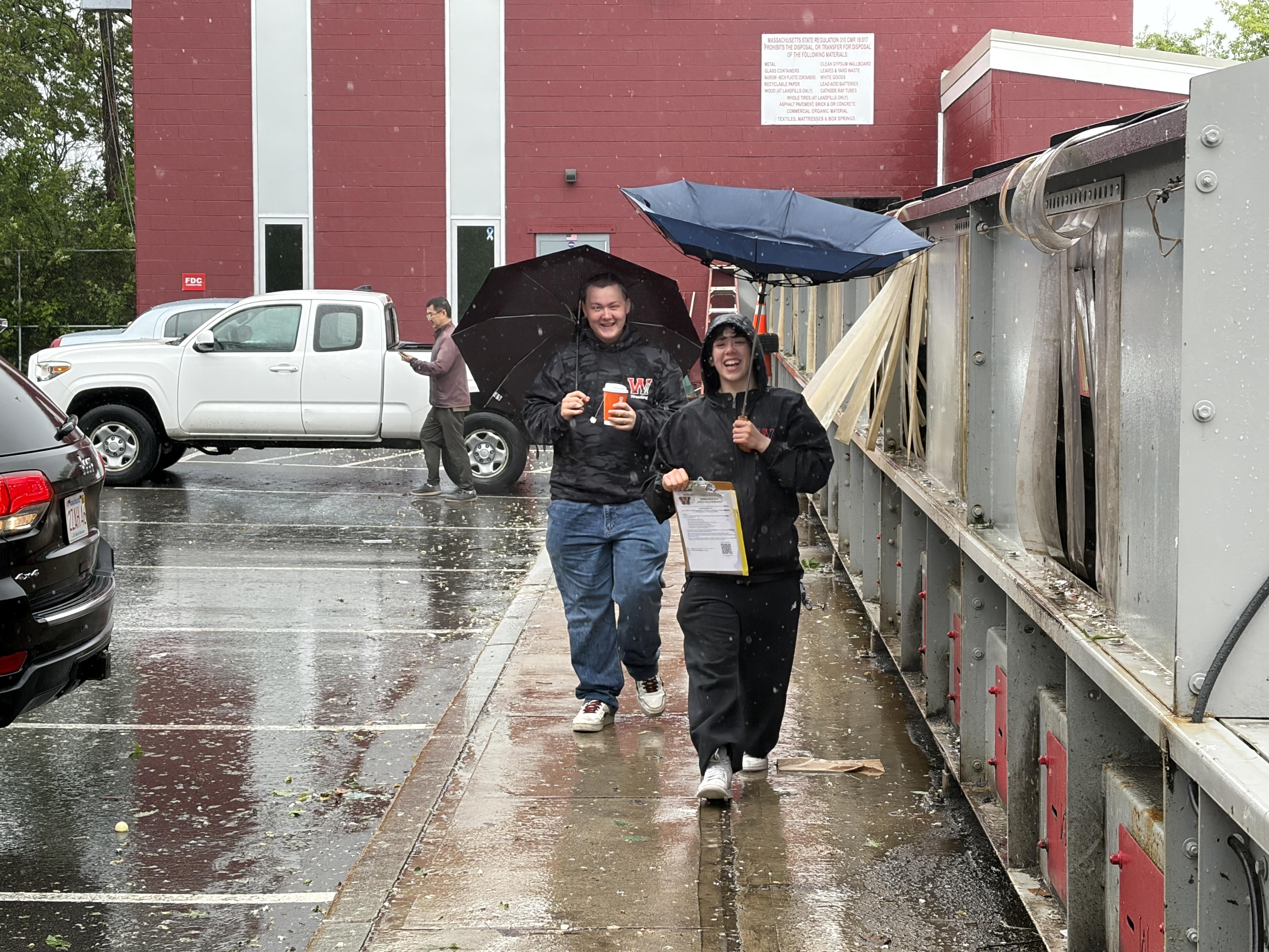 Smiles in the Rain: Winchester Wrestling Fundraises for the Team