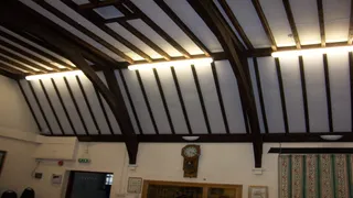 Aldbourne Memorial Hall after panels and dummy rafters were fitted between the dark timber roof beams.