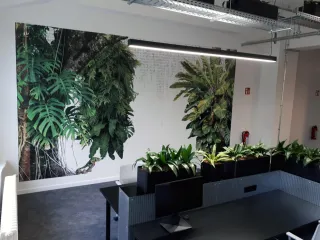  Wall mural with lush green tropical botanical design by East Coast Mural Pro 