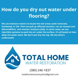 How do you dry out water under flooring?