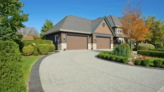 How Thick Should a Concrete Driveway Be? Essential Guidelines for Optimal Strength and Durability