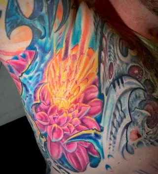 Dahlia flower armpit tattoo