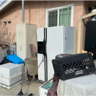 That Dead Refrigerator on Your Curb? We Will Take It for $75