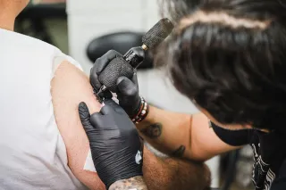 The Art of Micro Masterpieces: Tiny Tattoos by Clique Studio