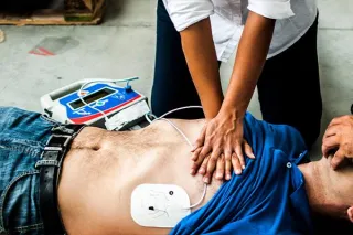 What is a Defibrillator and how do I use it?