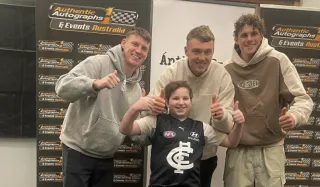 Roman meeting AFL legends