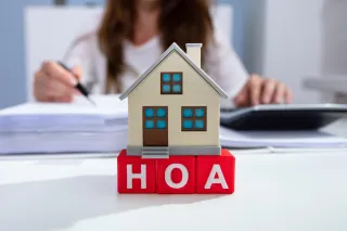 What Happens to Surplus Funds If You Still Owe HOA or Condo Fees?