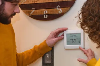 At what point in the season should I start using my heating system?