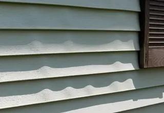 Why Vinyl Siding Buckles in Spring—and What Quad Cities Homeowners Should Know