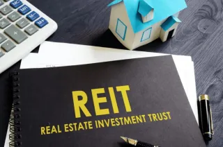 Passive Investment in Multifamily Syndication vs. REIT – Which is Better?