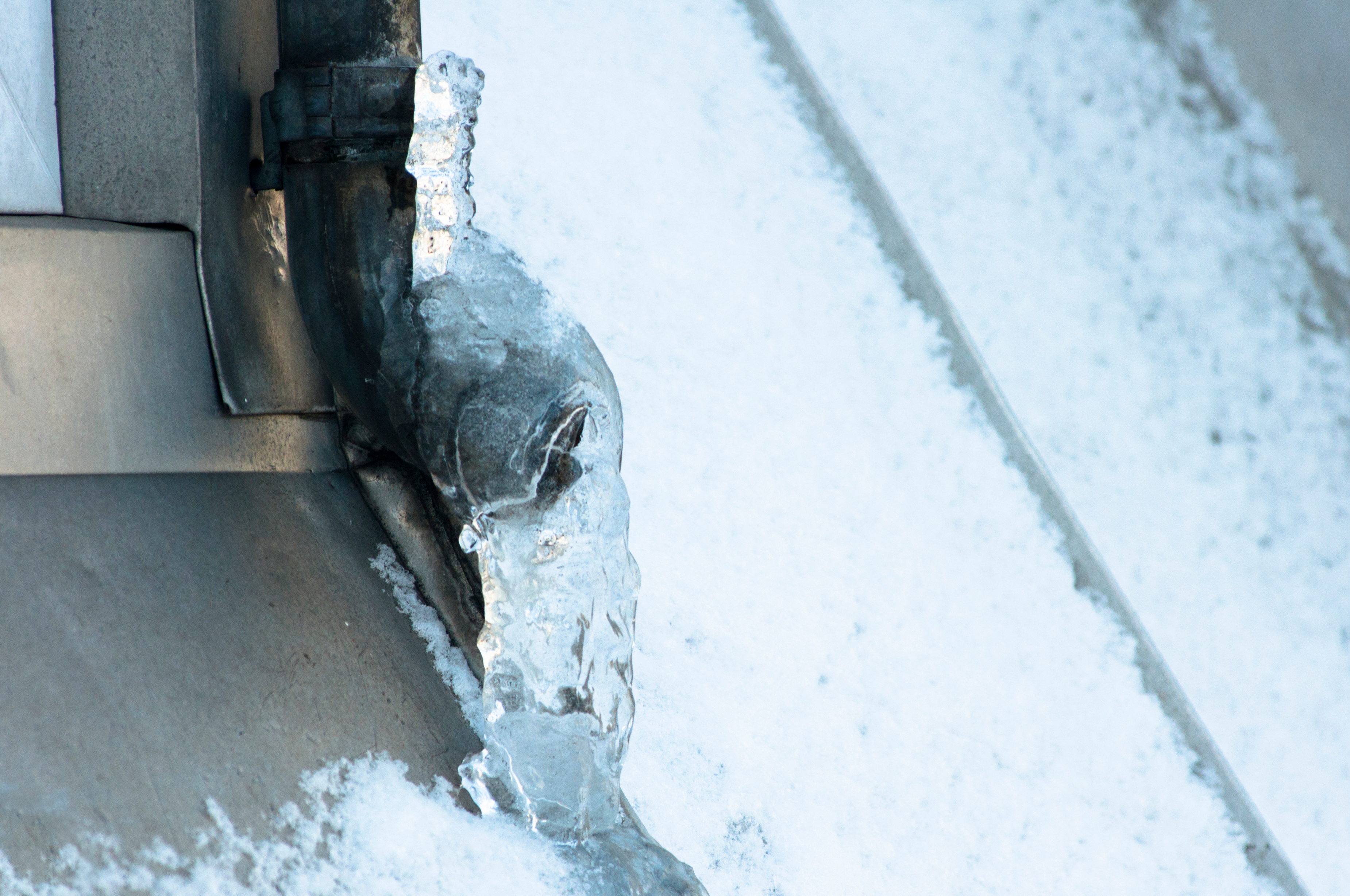 How to Maintain Gutters During Snow Season (And Why It Matters)
