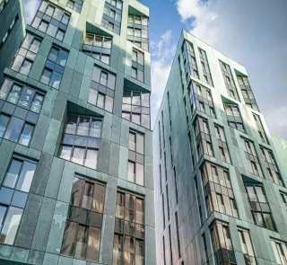 Real Estate Syndications and Economic Factors: Adapting to Changing Conditions