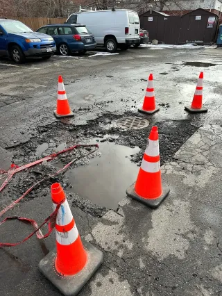 What Causes Asphalt Potholes?