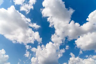 Why your brain sees faces in clouds—and how we use that in our Mysteries in Colour™ workshop to spark perspective, dialogue, and team connection