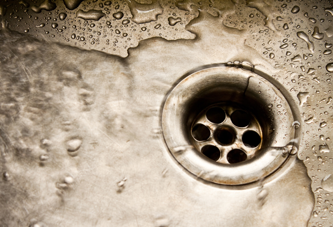 How to Unclog a Kitchen Sink: DIY Tips & When to Call a Plumber