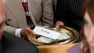 Tithing While in Debt: Should You Pause, Reduce, or Keep Giving?
