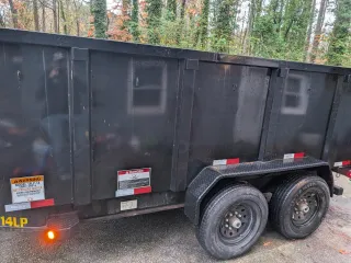 What Size Dumpster Do I Need? A Complete Guide to Choosing Between 12-Yard and 14-Yard Trailers for Your Project
