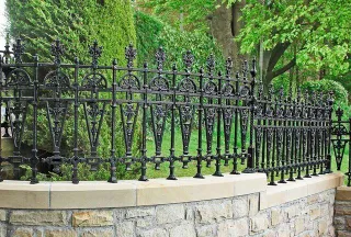 What Are the Key Features That Make Wrought Iron Fences So Durable?