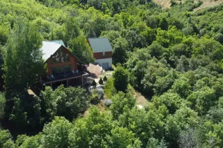 Discover Mountain Charm and Experience Midway Hillside Cabin Getaway with Game Room, Hot Tub, and Space for Families or Friends