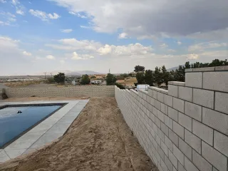 Transforming a Challenging Landscape with a Custom Retaining Wall in Apple Valley