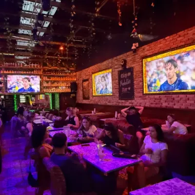 Fans watching a match at La República Sport Bar