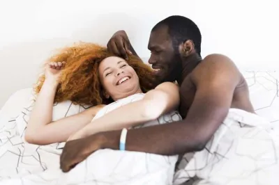 Happy couple in bed
