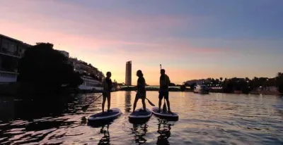 Sunset paddle boarding Guadalquivir Seville