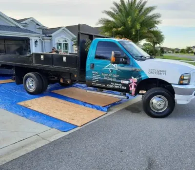 NB Roofs work truck parked at a residential roofing job