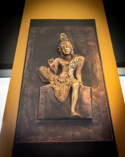Gold relief artwork on the restaurant’s feature wall