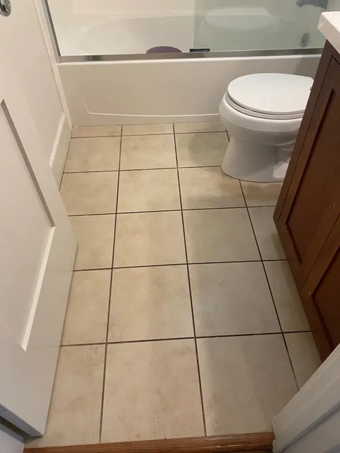 Bathroom tile and grout before professional cleaning and restoration in South Bay CA