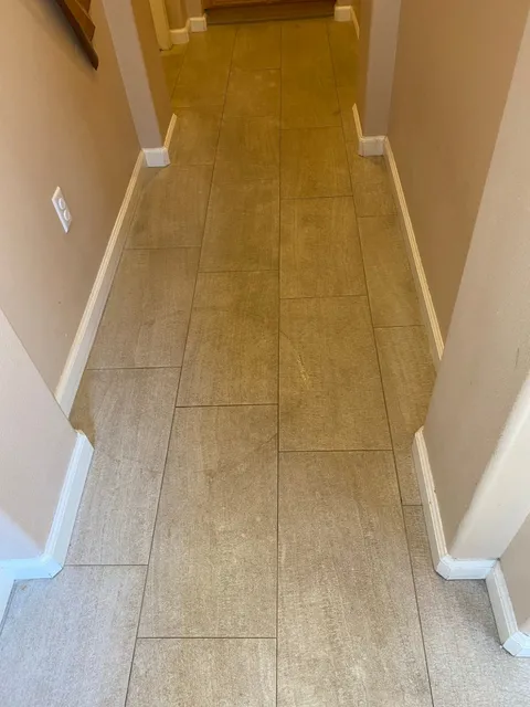 Hallway large format tile before professional deep cleaning in Silicon Valley CA