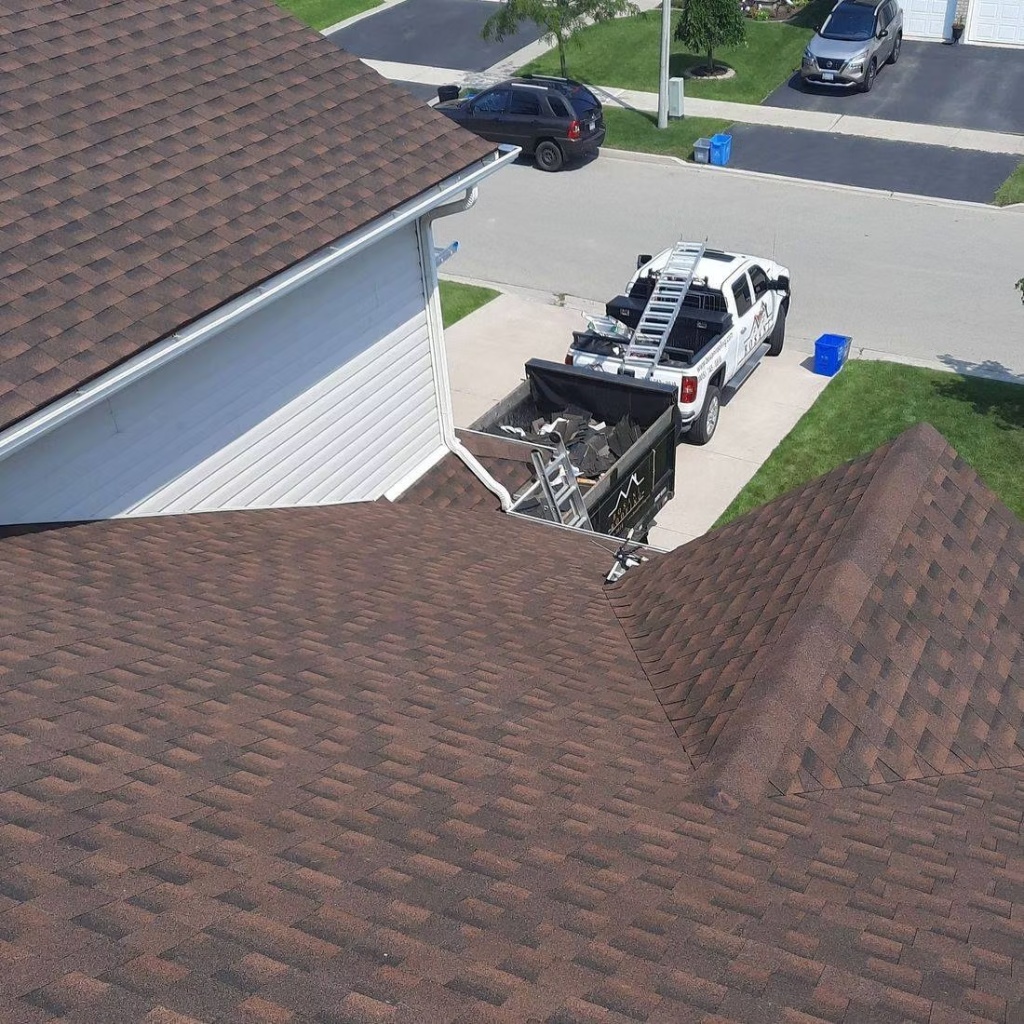 Residential roof tear-off and full replacement underway by Bosani Roofing in Hamilton