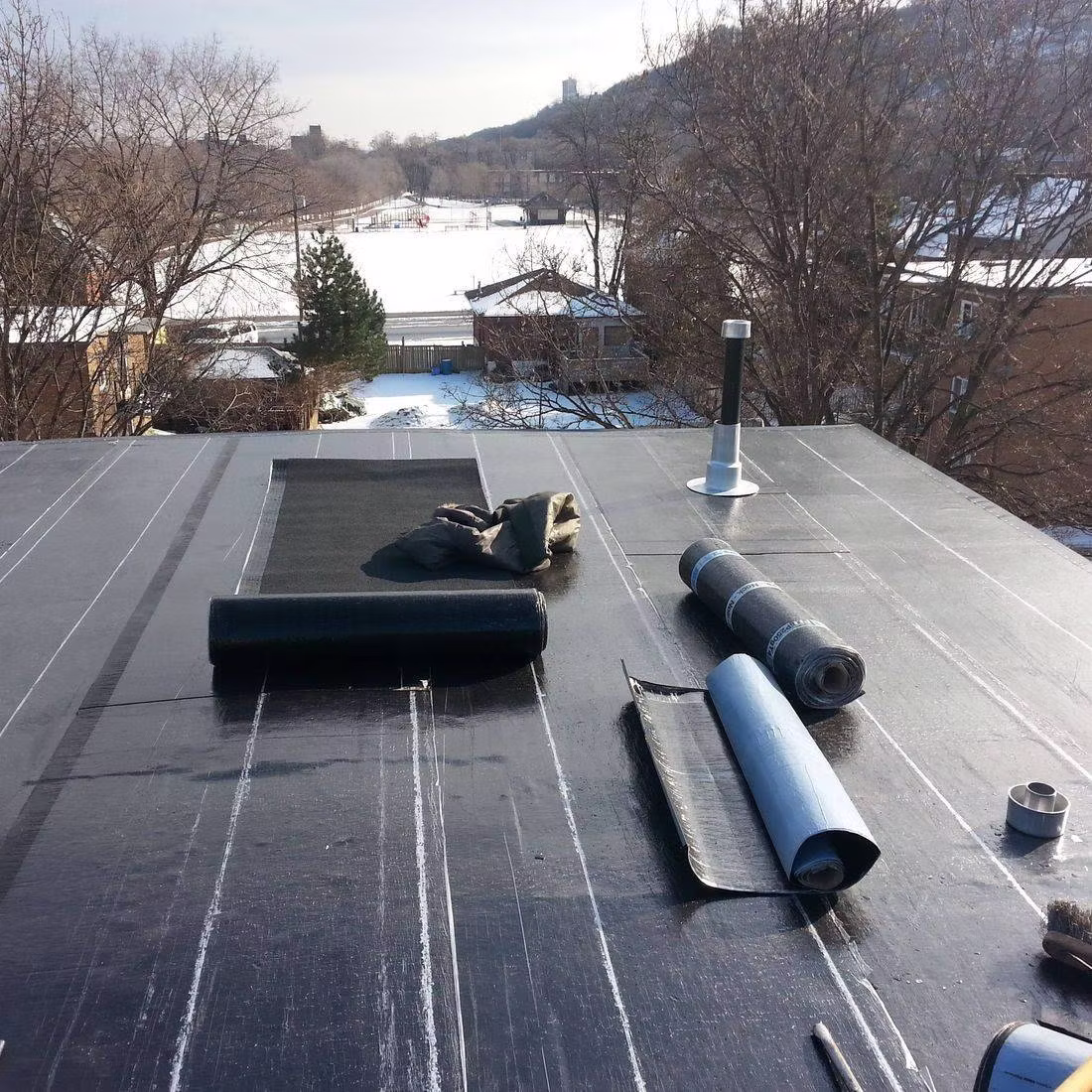 Flat roofing installation and torch-down membrane service by Bosani Roofing in Hamilton Ontario
