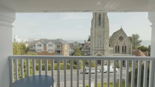 Balcony view to the church spire at The Fig Tree, Shanklin