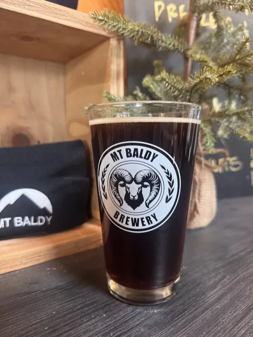 A glass of New Range Brown