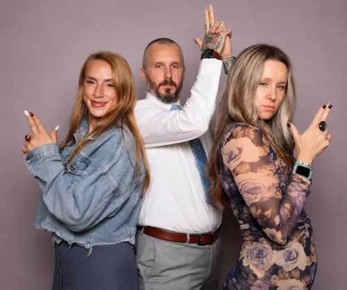 Group of friends posing playfully at an event