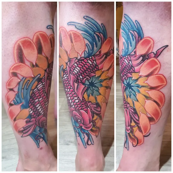 Koi chrysanthemum shin tattoo by Derrick at Sting Studio Ottawa